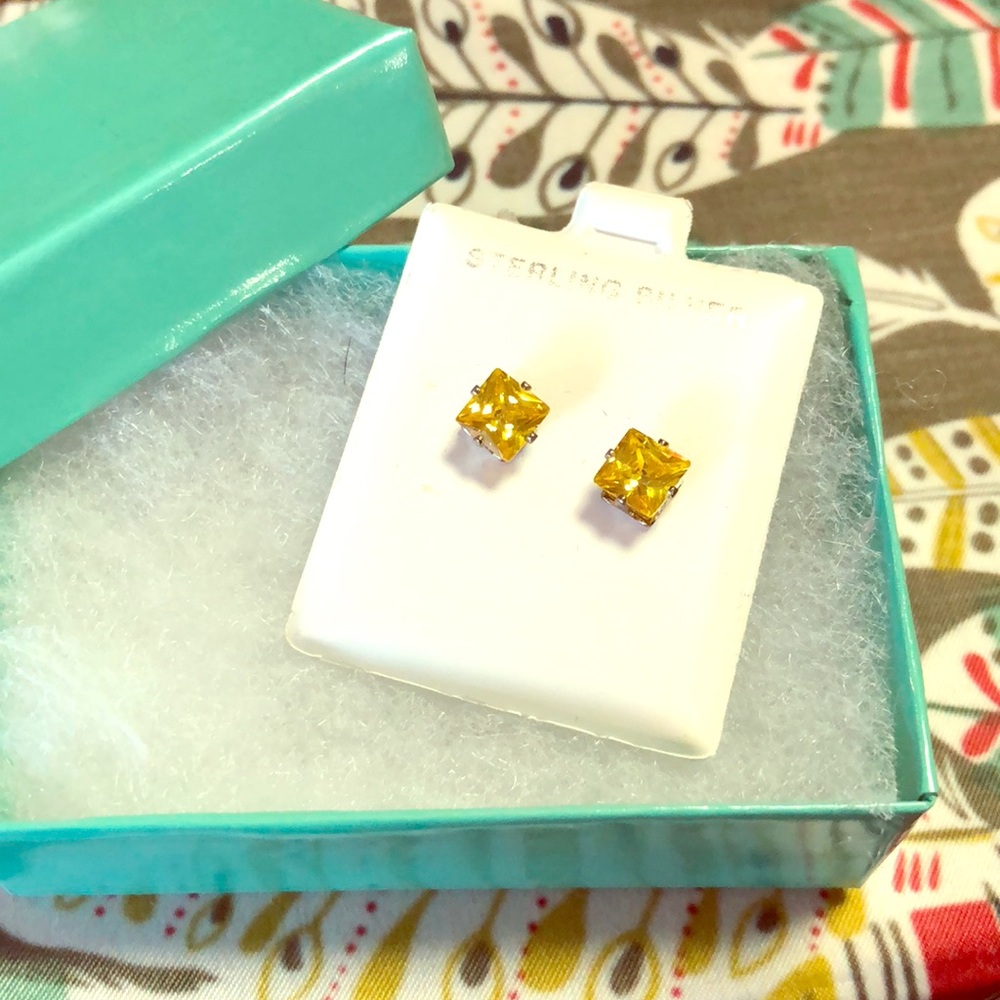 Sterling silver yellow cz stud earrings
